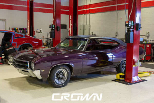 Custom 1969 Buick GS400 restomod built by Crown Customs in Tucson, Arizona, with LS376/480 power, 4L70-E automatic transmission, Forgeline wheels, black stripes, and custom interior work.