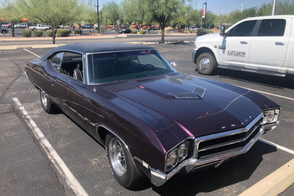 Custom 1969 Buick GS400 restomod built by Crown Customs in Tucson, Arizona, with LS376/480 power, 4L70-E automatic transmission, Forgeline wheels, black stripes, and custom interior work.