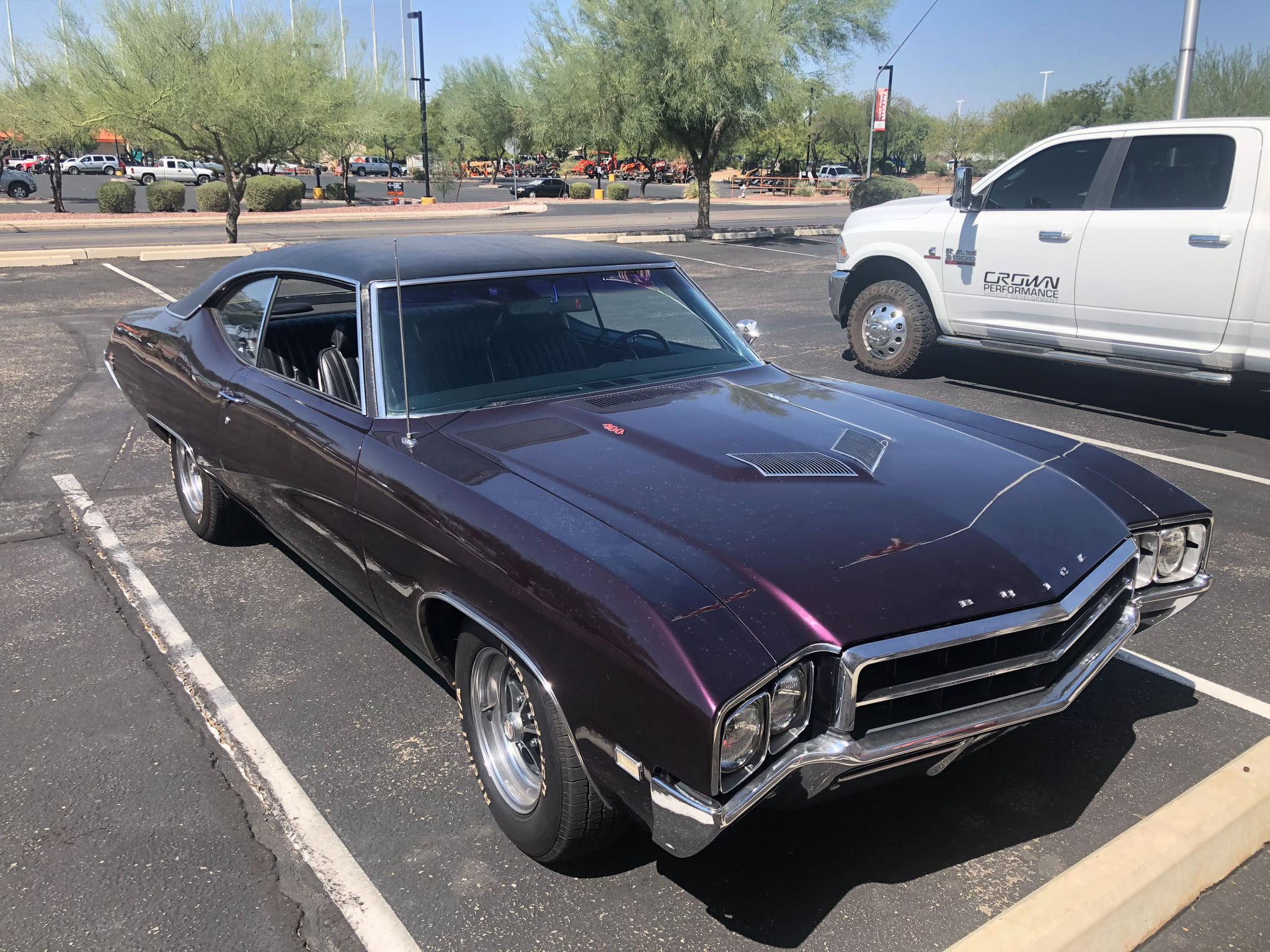 Custom 1969 Buick GS400 driver restomod by Crown Customs Custom 1969 Buick GS400 restomod built by Crown Customs in Tucson, Arizona, with LS376/480 power, 4L70-E automatic transmission, Forgeline wheels, black stripes, and custom interior work.