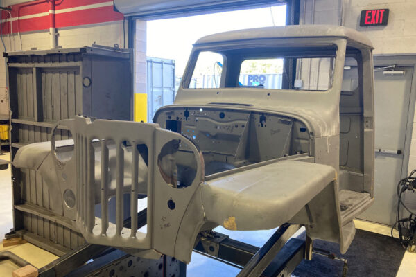 Custom 1961 Willys Jeep Pickup restomod built by Crown Customs in Tucson, Arizona, with restored bodywork, custom interior, 4x4 upgrades, and modern electronics.