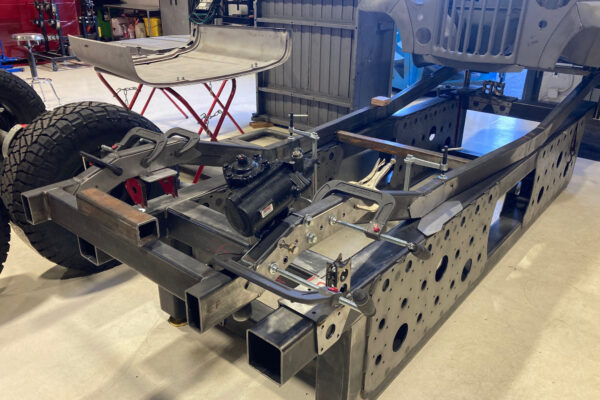 Custom 1961 Willys Jeep Pickup restomod built by Crown Customs in Tucson, Arizona, with restored bodywork, custom interior, 4x4 upgrades, and modern electronics.