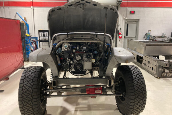 Custom 1961 Willys Jeep Pickup restomod built by Crown Customs in Tucson, Arizona, with restored bodywork, custom interior, 4x4 upgrades, and modern electronics.