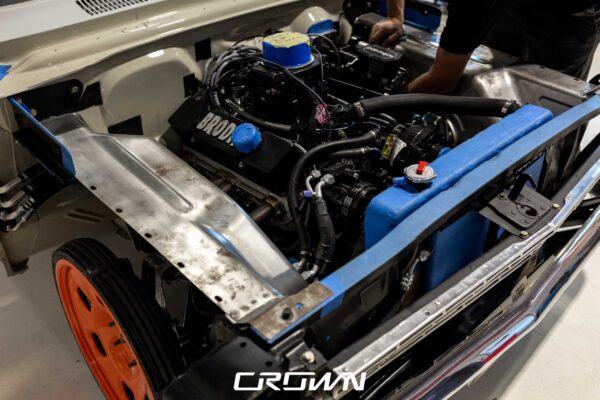 400ci small block engine bay of a 1964 Chevrolet Nova during Pro Touring build at Crown Customs