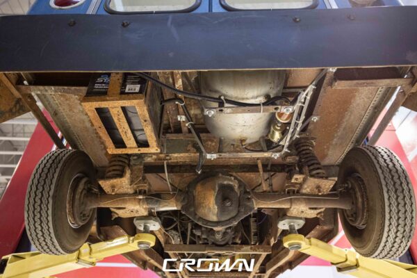 Underside chassis and suspension of a 1964 Rand Mailster during electric conversion