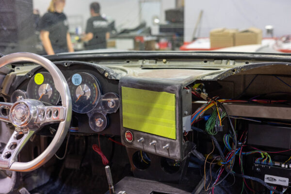 Dashboard wiring harness and digital display panel in a 1963 Corvette Sting Ray restomod