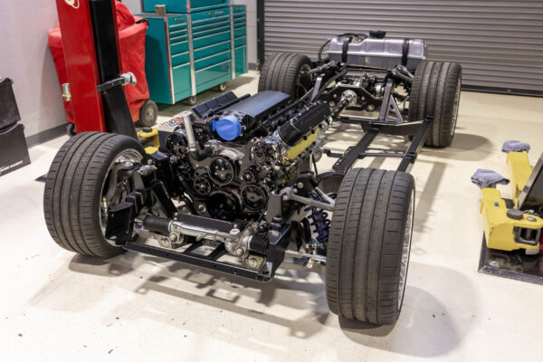 Complete rolling chassis with LS7 engine and wide tires for a 1963 Corvette Sting Ray restomod