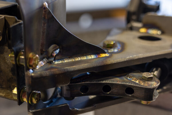 Close-up of a welded suspension bracket on a 1963 Corvette Sting Ray restomod