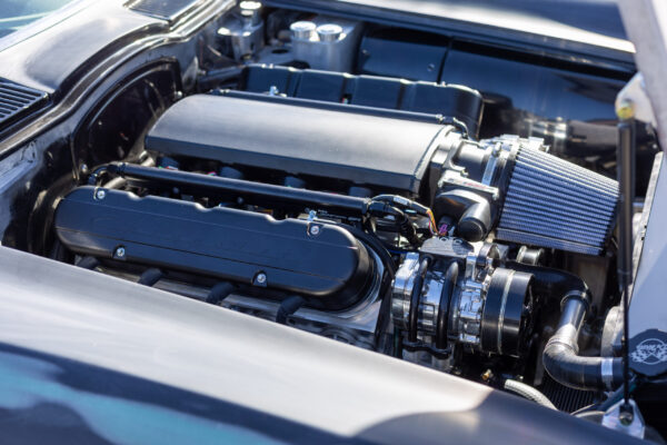Finished LS engine bay of a 1963 Corvette Sting Ray restomod, top-down view