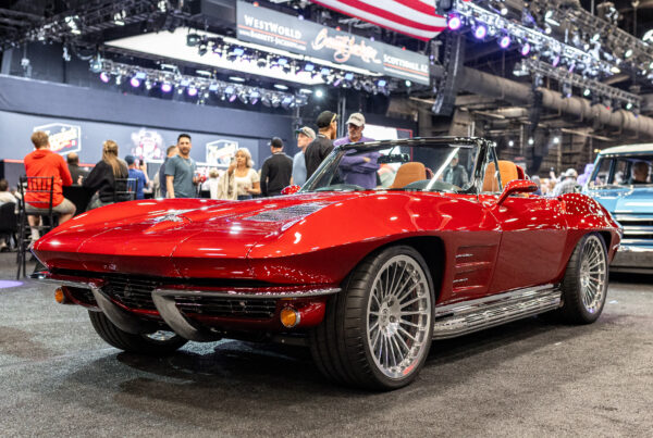 Finished 1963 Corvette Sting Ray restomod on the show floor at Barrett-Jackson, front three-quarter view