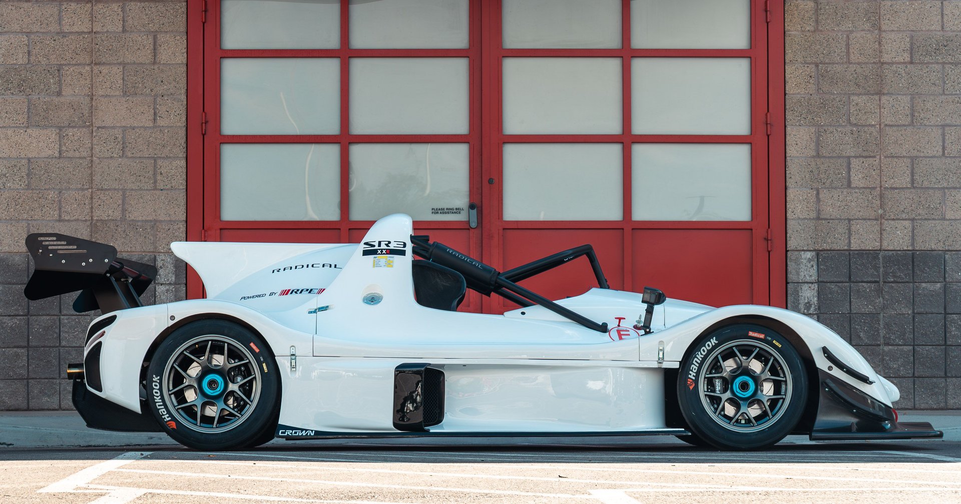 Radical SR3 XXR 1340 side profile showing lightweight prototype race car design