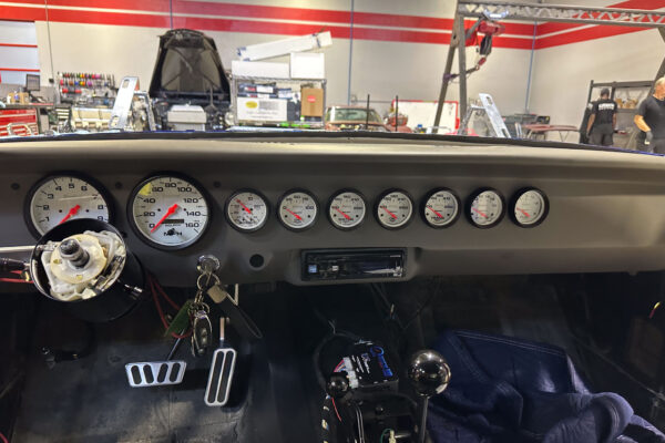 The 1965 Ford Mustang Fastback twin turbo custom build during engine and driveline work at Crown Customs