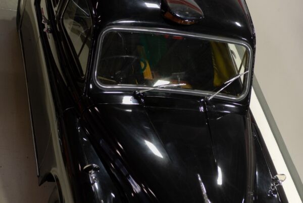Front three-quarter view of the 1967 Austin FX4 London Taxi Cab showing its distinctive upright grille and cab shape