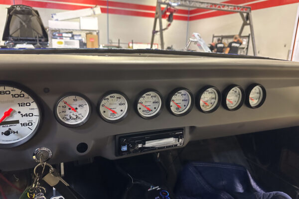 The 1965 Ford Mustang Fastback twin turbo custom build during engine and driveline work at Crown Customs