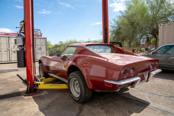 Underside inspection of the 1970 Chevrolet Corvette documenting its initial condition before restoration at Crown Customs