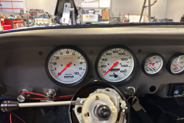 The 1965 Ford Mustang Fastback twin turbo custom build during engine and driveline work at Crown Customs