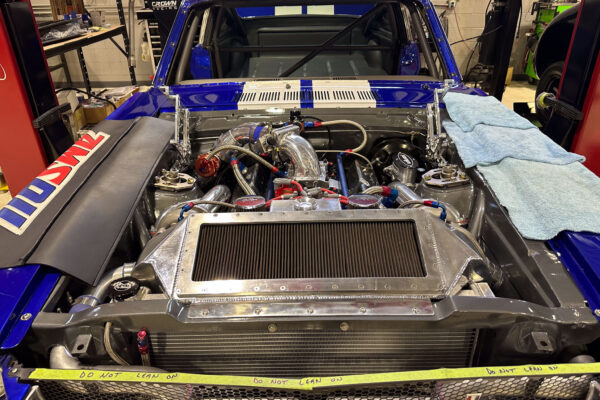 The 1965 Ford Mustang Fastback twin turbo custom build during engine and driveline work at Crown Customs