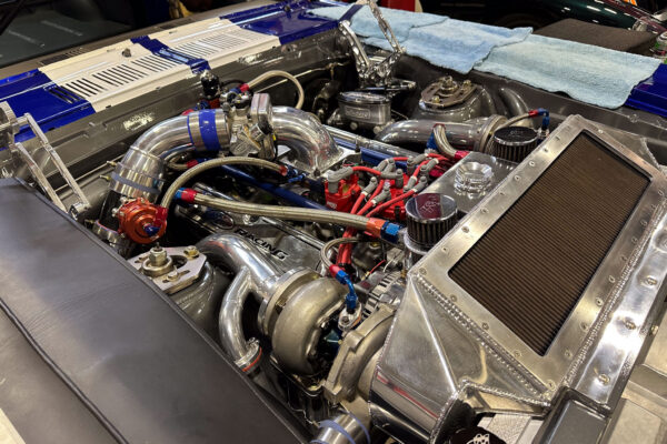The 1965 Ford Mustang Fastback twin turbo custom build during engine and driveline work at Crown Customs