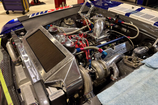 The 1965 Ford Mustang Fastback twin turbo custom build during engine and driveline work at Crown Customs