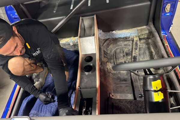 Interior and systems integration work on the 1965 Ford Mustang Fastback twin turbo custom build at Crown Customs