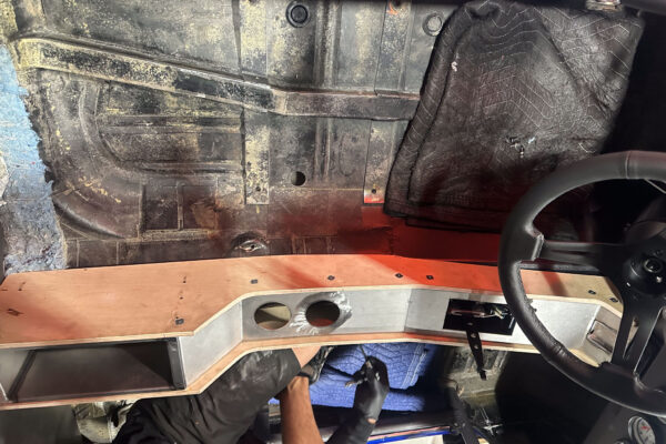 Interior and systems integration work on the 1965 Ford Mustang Fastback twin turbo custom build at Crown Customs