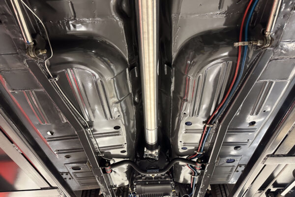Interior and systems integration work on the 1965 Ford Mustang Fastback twin turbo custom build at Crown Customs