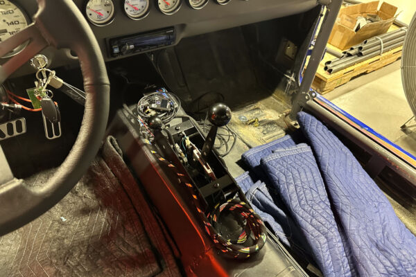 Interior and systems integration work on the 1965 Ford Mustang Fastback twin turbo custom build at Crown Customs