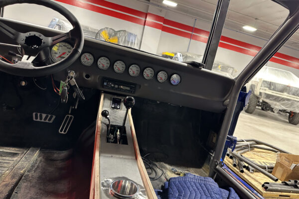 Interior and systems integration work on the 1965 Ford Mustang Fastback twin turbo custom build at Crown Customs