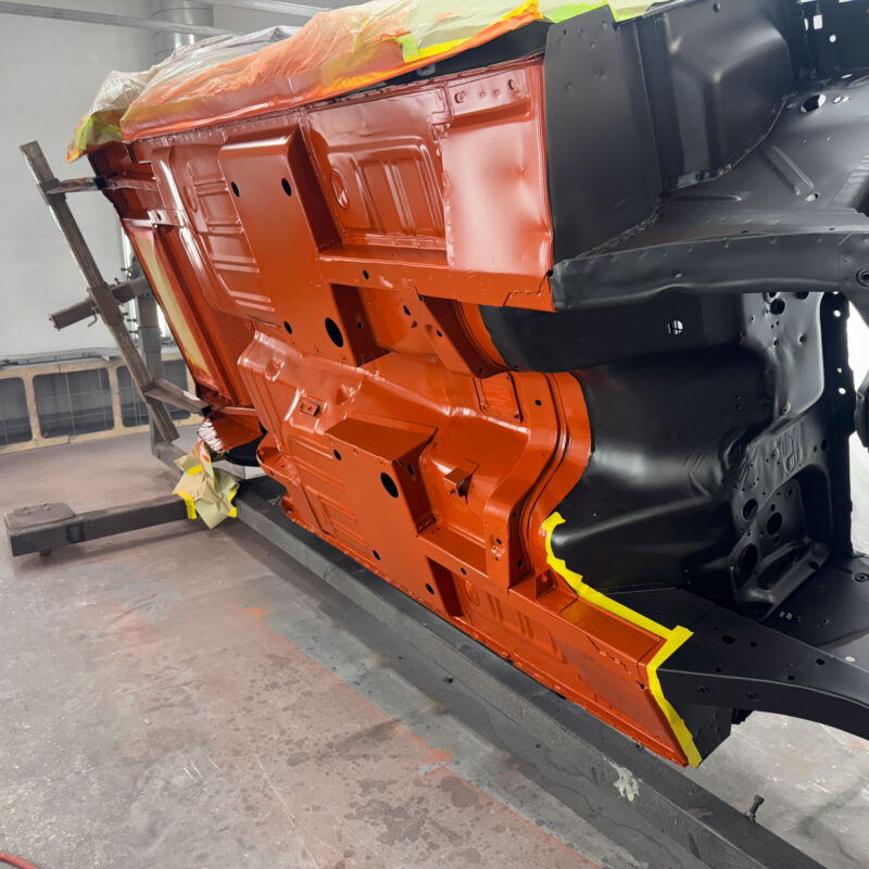 Body panel and paint work on a 1967 Ford Mustang convertible during restoration