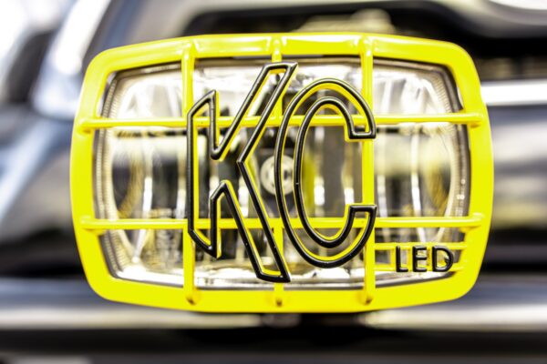 Close-up of a KC HiLiTES driving light on a 2016 Toyota Tacoma tribute truck