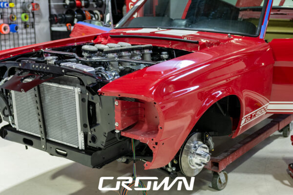 1968 Shelby GT500 Fastback by Crown Customs, finished in Candy Apple Red with Le Mans stripes