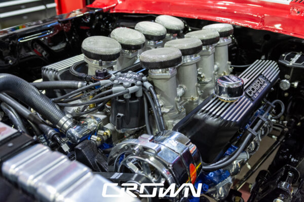 1968 Shelby GT500 Fastback by Crown Customs, finished in Candy Apple Red with Le Mans stripes