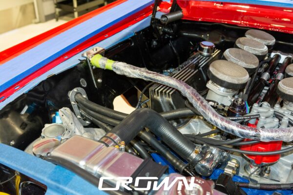 1968 Shelby GT500 Fastback by Crown Customs, finished in Candy Apple Red with Le Mans stripes