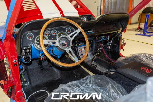 1968 Shelby GT500 Fastback by Crown Customs, finished in Candy Apple Red with Le Mans stripes