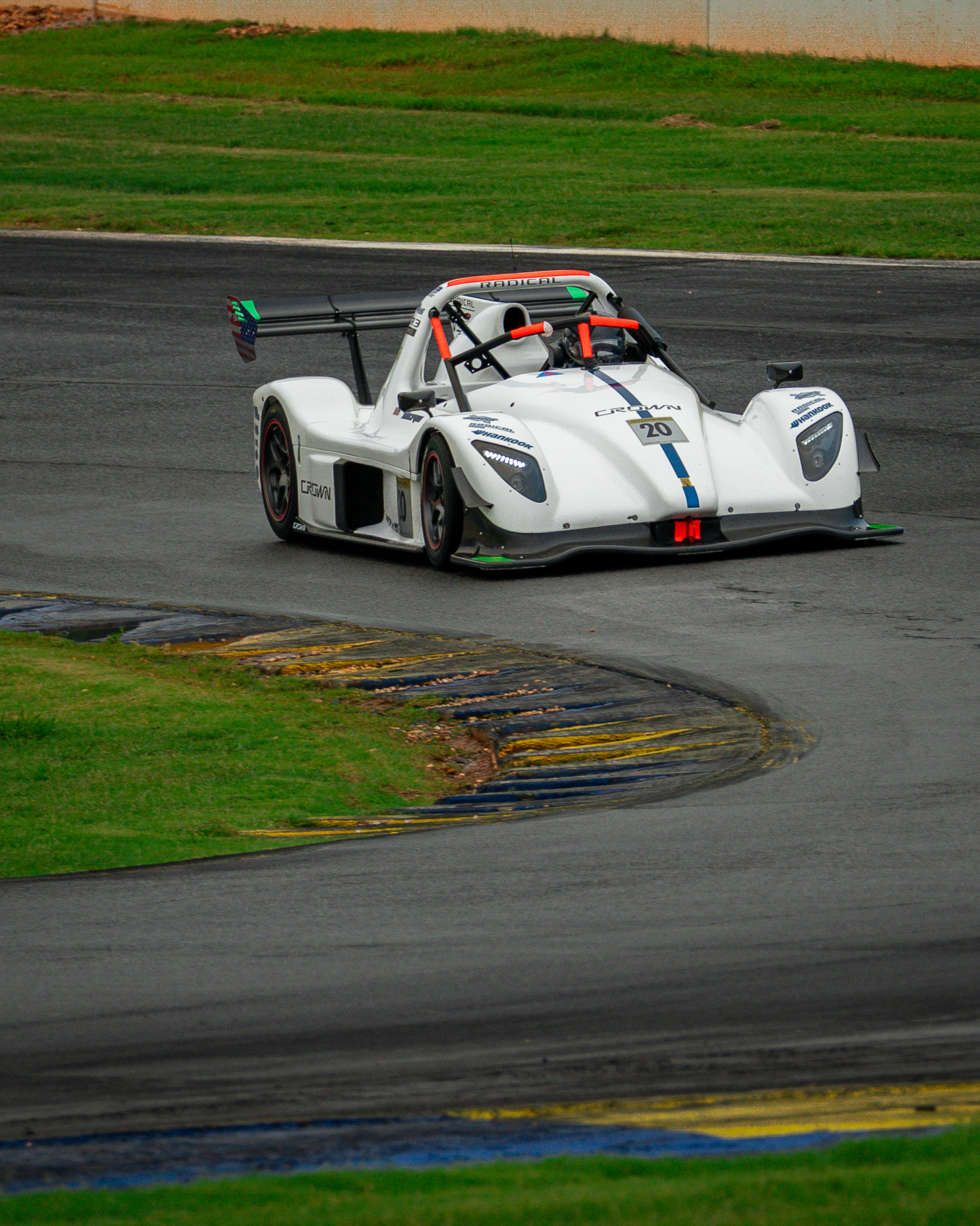 Ryan George driving the white number 20 Crown Radical SR3 at Michelin Raceway Road Atlanta