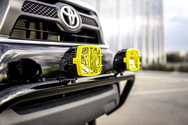 Front grille and KC HiLiTES lights on a 2016 Toyota Tacoma Back to the Future tribute truck