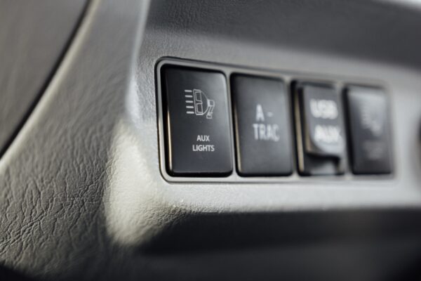 Custom fuse box installed for the light bar wiring on a Toyota Tacoma tribute truck