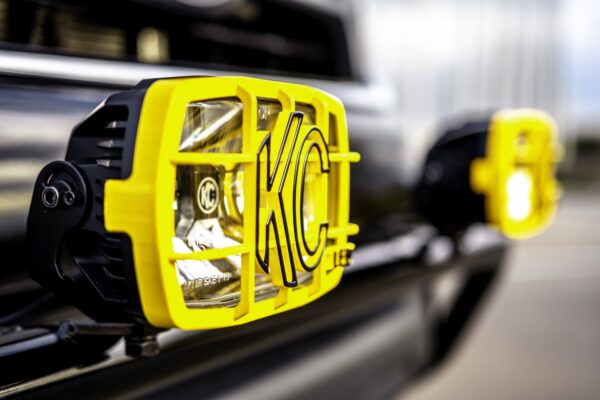 Angled detail of a KC HiLiTES light on a Toyota Tacoma Back to the Future tribute truck