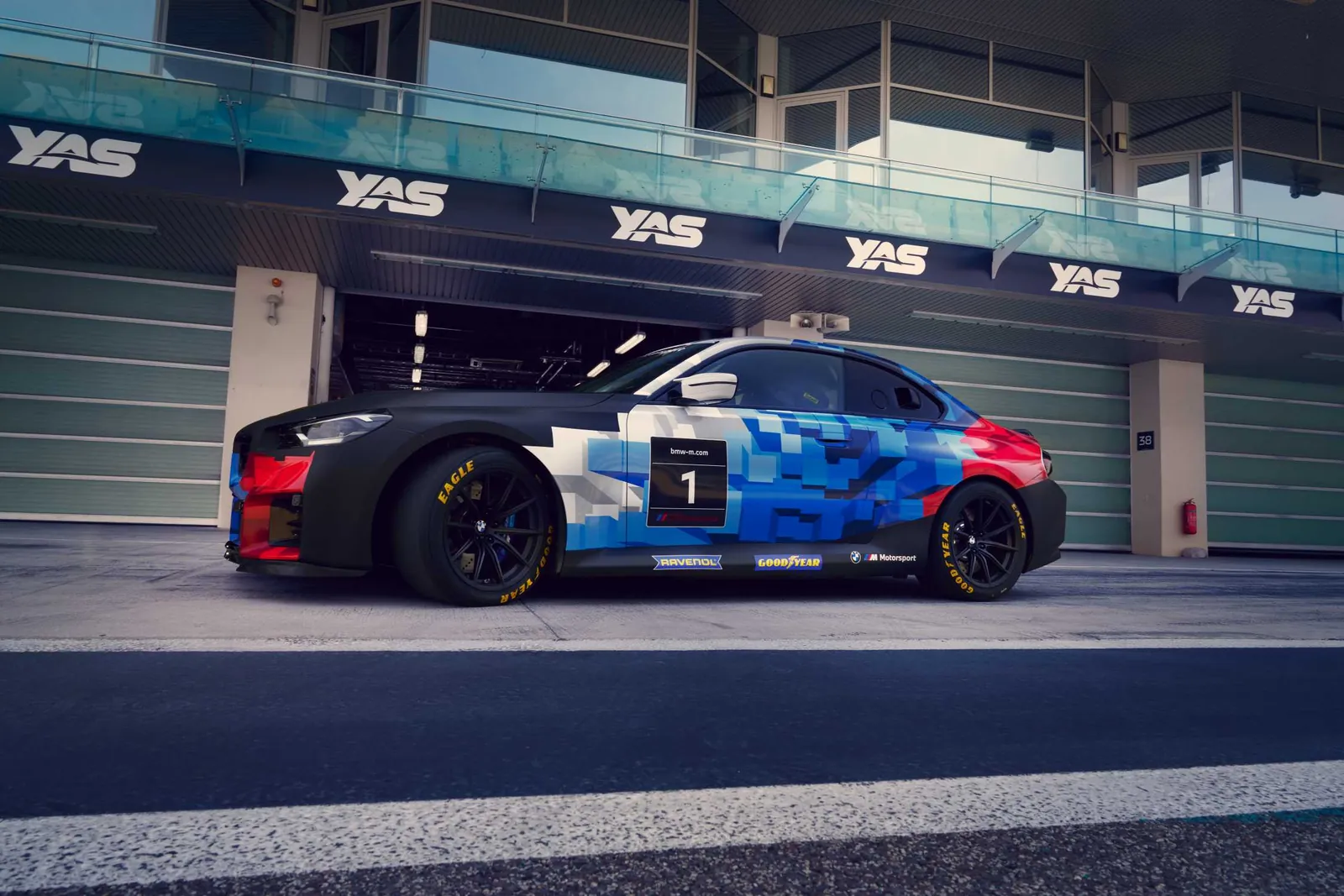 Side view of the new BMW M2 Racing in the pit lane at Yas Marina