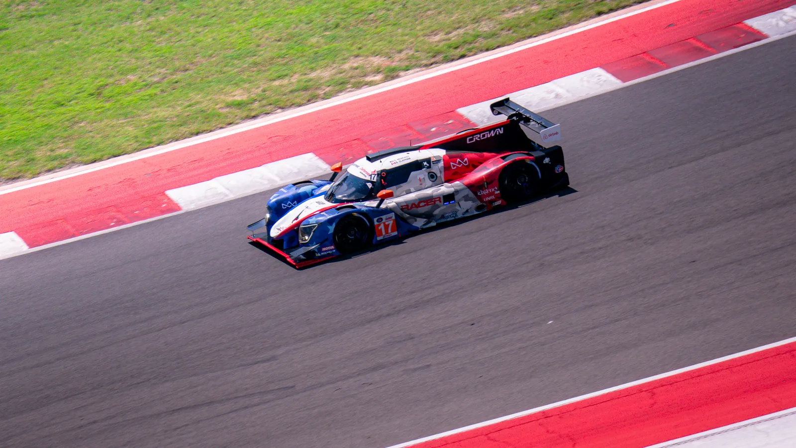 Crown Racing's No. 17 Ligier JS P320 LMP3 at speed through a corner at Circuit of The Americas during the IMSA Airbnb Endurance Challenge