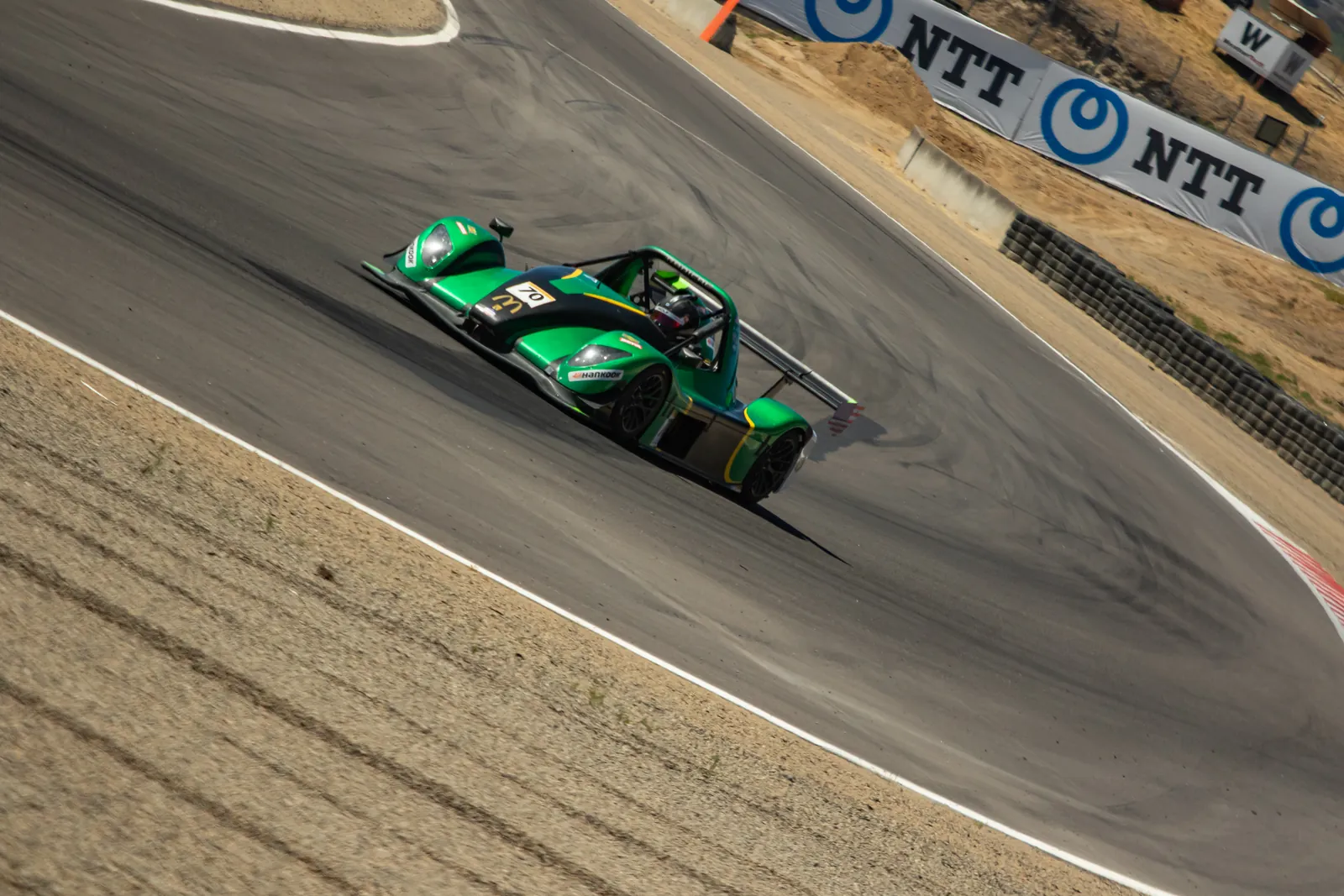 Green Crown-run Radical SR3 diving down the Corkscrew at WeatherTech Raceway Laguna Seca in Radical Cup North America