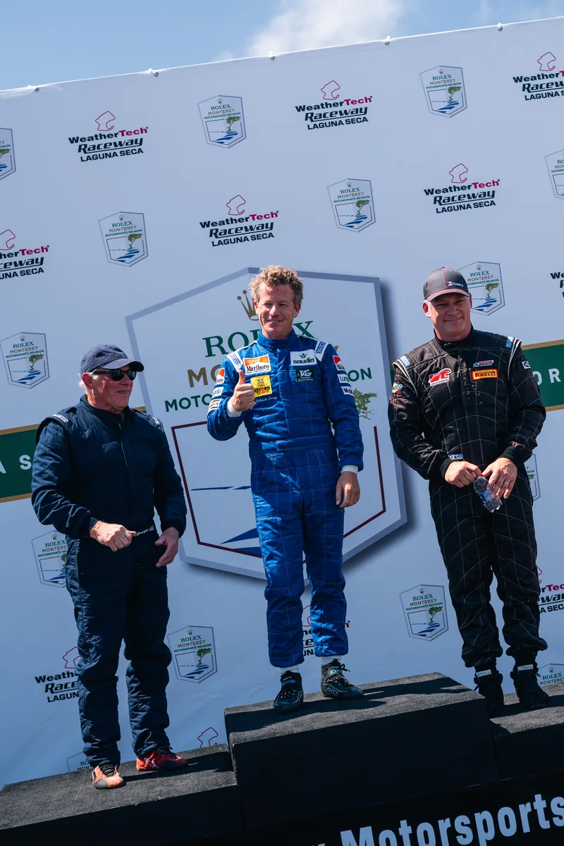 Winners on the top step of the podium at the 2026 Rolex Monterey Motorsports Reunion, Laguna Seca